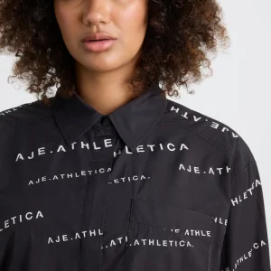 Discount Aje ATHLETICA All Over Logo Spray Shirt 406 Black/White