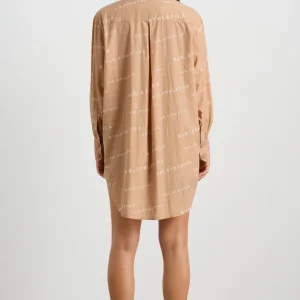 Shop Aje ATHLETICA All Over Logo Spray Shirt 406 Natural Tan / White