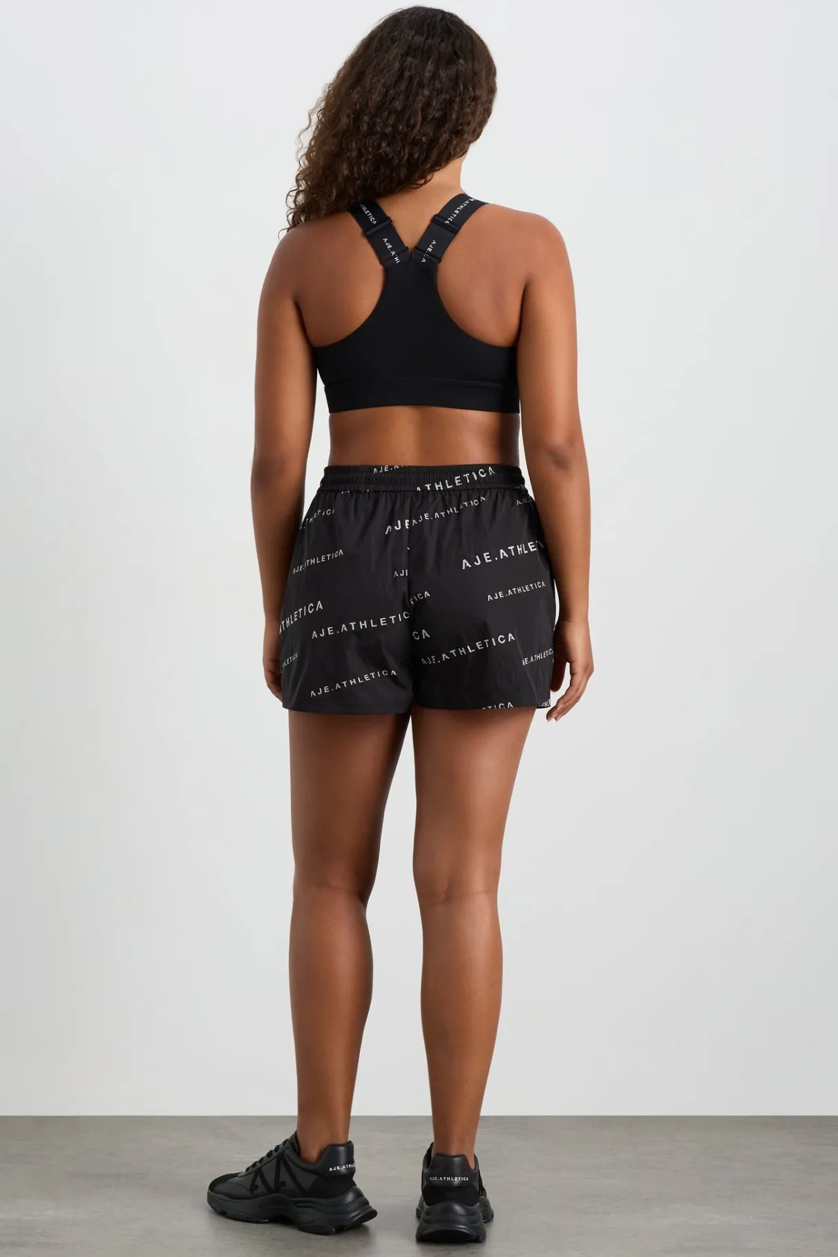 all_over_logo_spray_short__8-1.webp Clearance Aje ATHLETICA All Over Logo Spray Short 616 Black/White