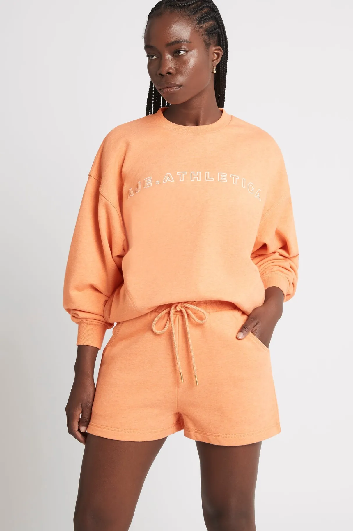 all_rounder_sweat_shorts__0-1.webp Store Aje ATHLETICA All Rounder Sweat Shorts 616 Orange Marle