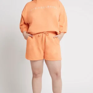 Store Aje ATHLETICA All Rounder Sweat Shorts 616 Orange Marle