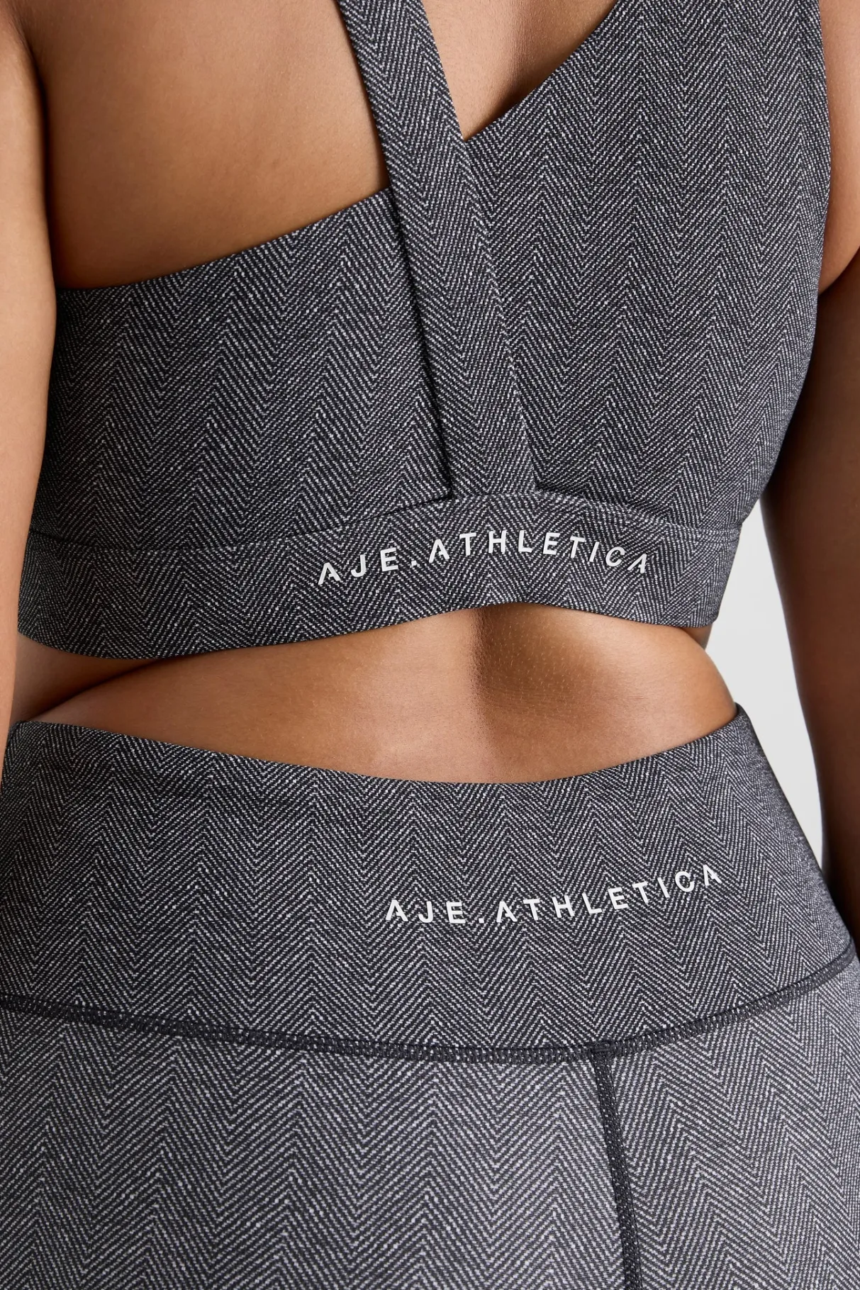 asymmetric_racer_sports_bra__12.webp Store Aje ATHLETICA Asymmetric Racer Sports Bra 382 Herringbone Print