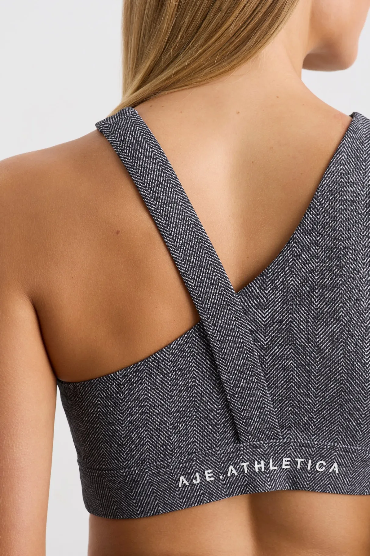 asymmetric_racer_sports_bra__3.webp Store Aje ATHLETICA Asymmetric Racer Sports Bra 382 Herringbone Print