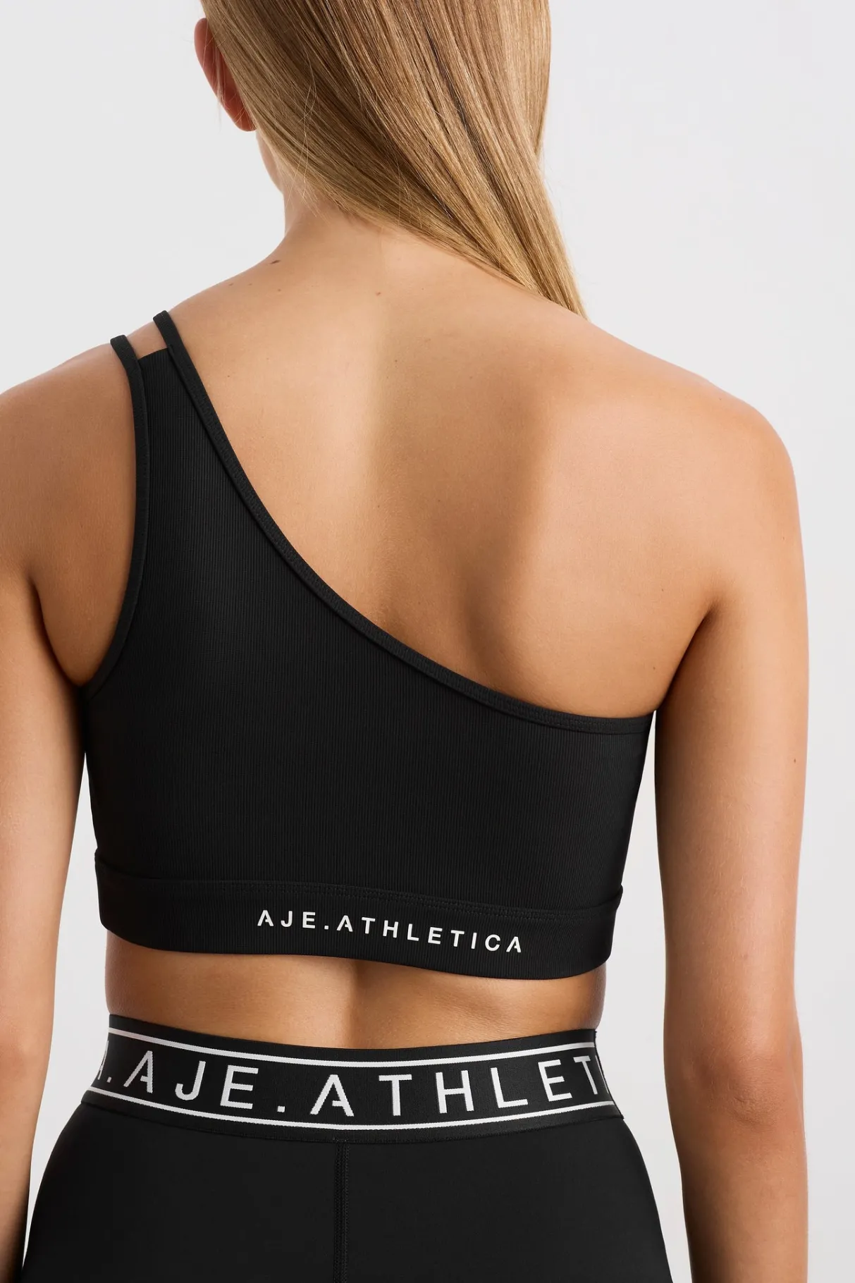 asymmetric_ribbed_crop_top__3.webp Sale Aje ATHLETICA Asymmetric Ribbed Crop Top 386 Black