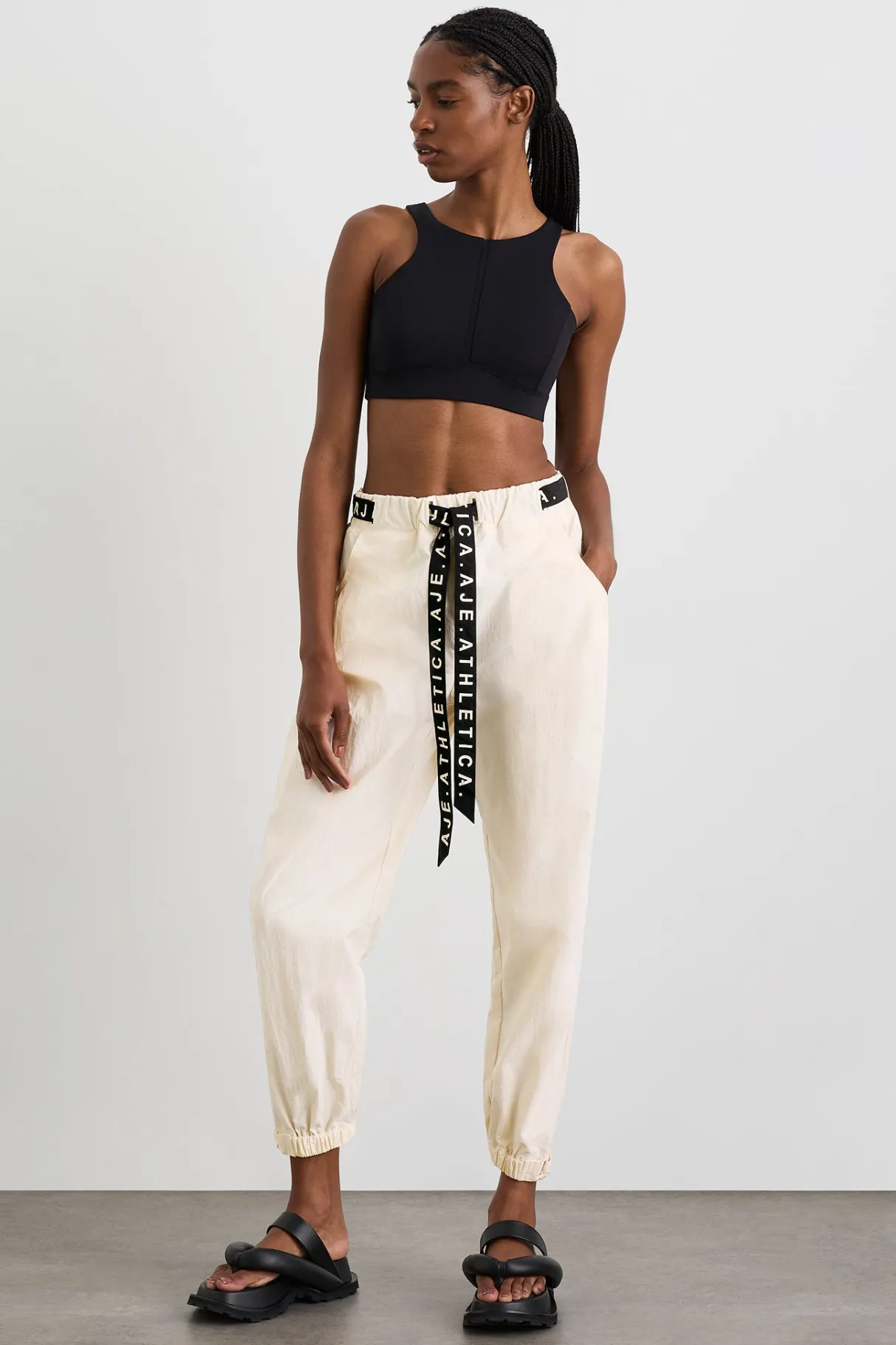 belted_windbreak_pant__0-2.webp Shop Aje ATHLETICA Belted Windbreak Pant 502 Limestone Beige Black