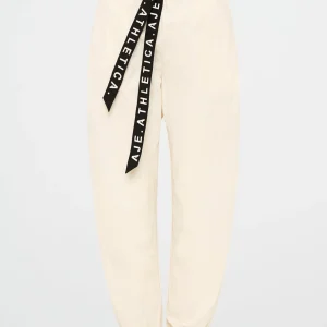 Shop Aje ATHLETICA Belted Windbreak Pant 502 Limestone Beige Black