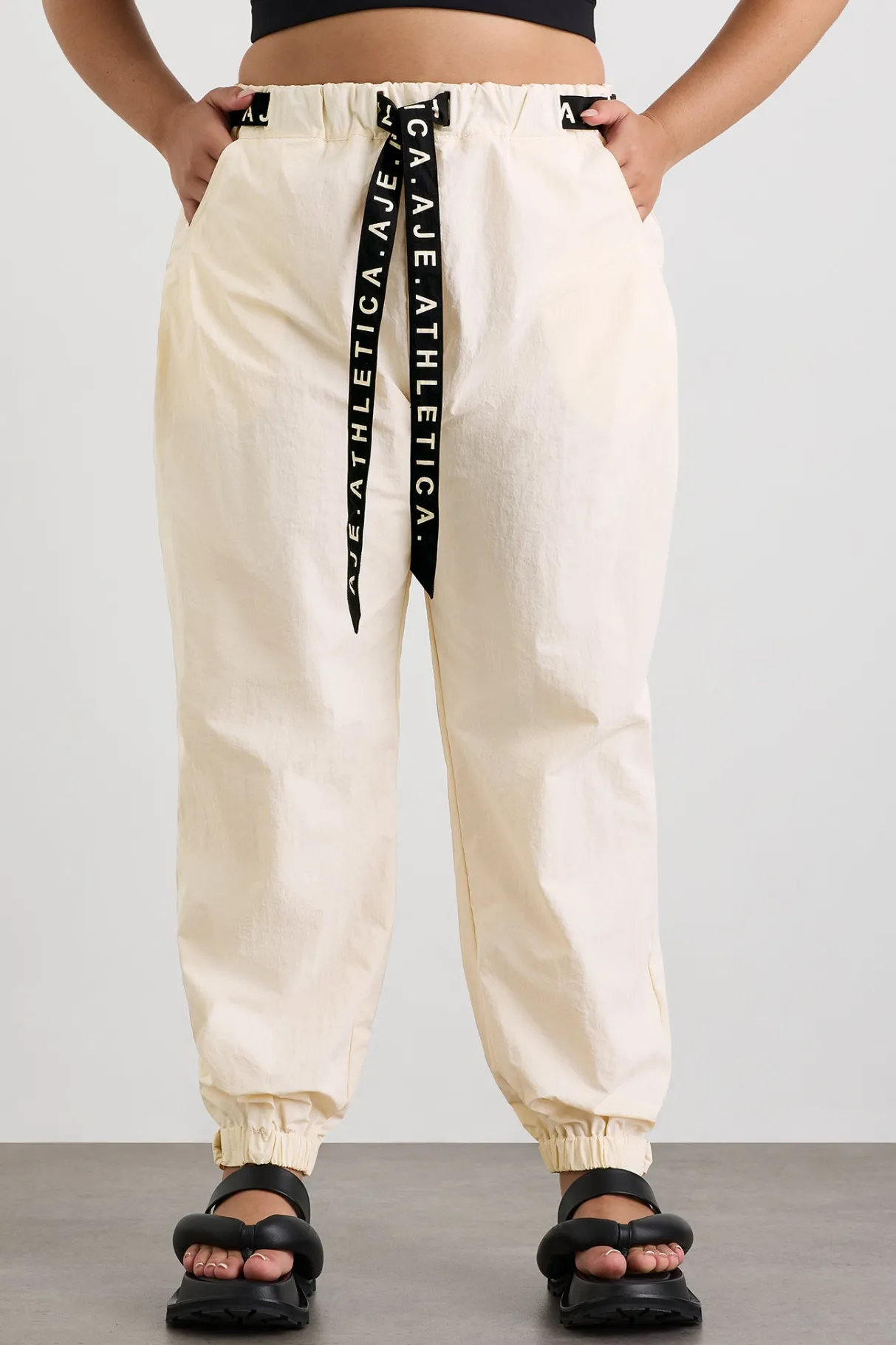 belted_windbreak_pant__12-2.webp Shop Aje ATHLETICA Belted Windbreak Pant 502 Limestone Beige Black