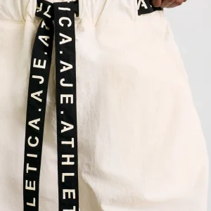 Shop Aje ATHLETICA Belted Windbreak Pant 502 Limestone Beige Black