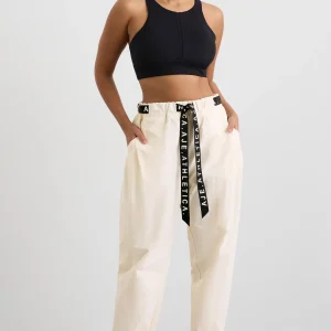 Shop Aje ATHLETICA Belted Windbreak Pant 502 Limestone Beige Black