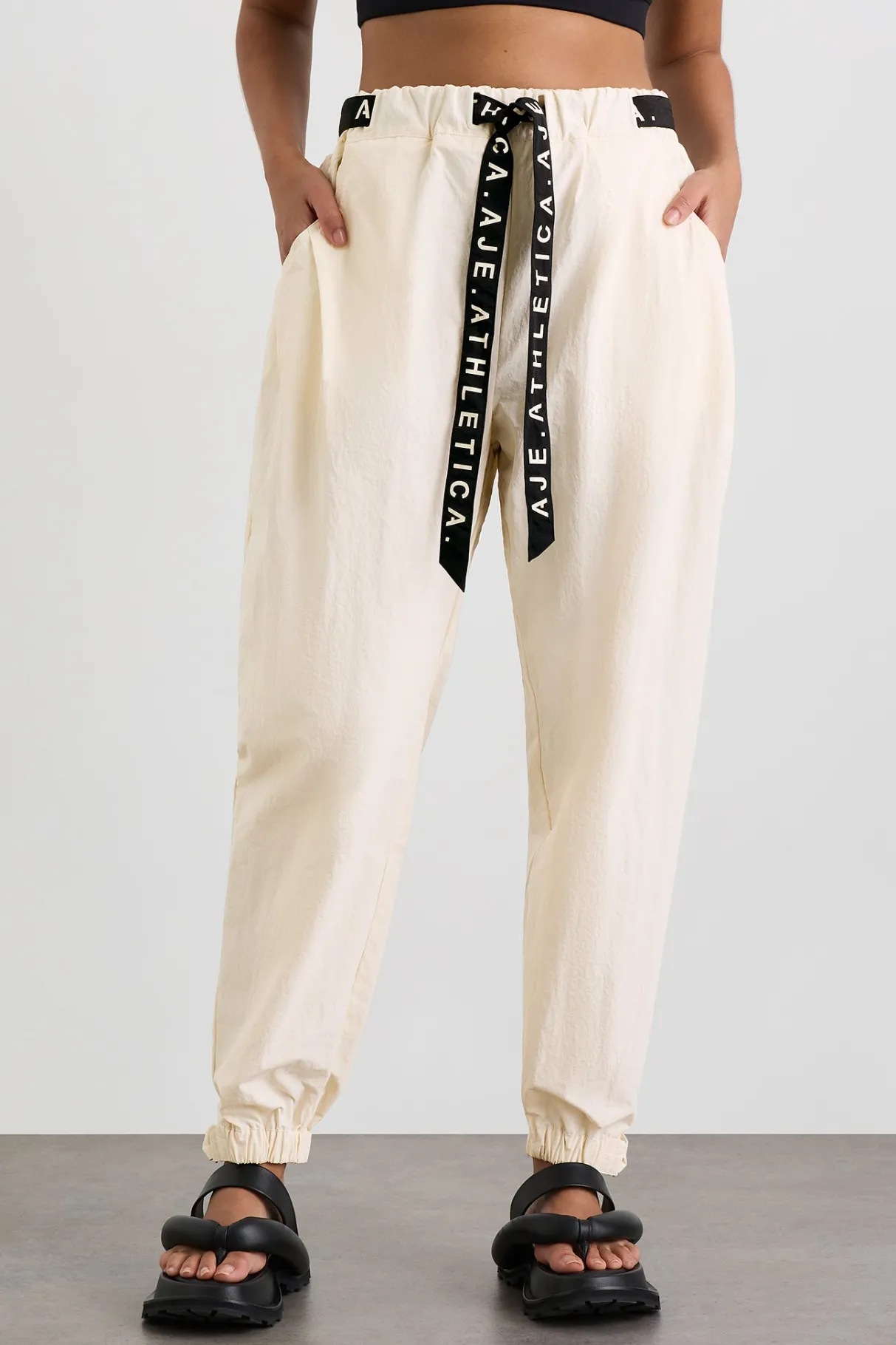 belted_windbreak_pant__7-2.webp Shop Aje ATHLETICA Belted Windbreak Pant 502 Limestone Beige Black