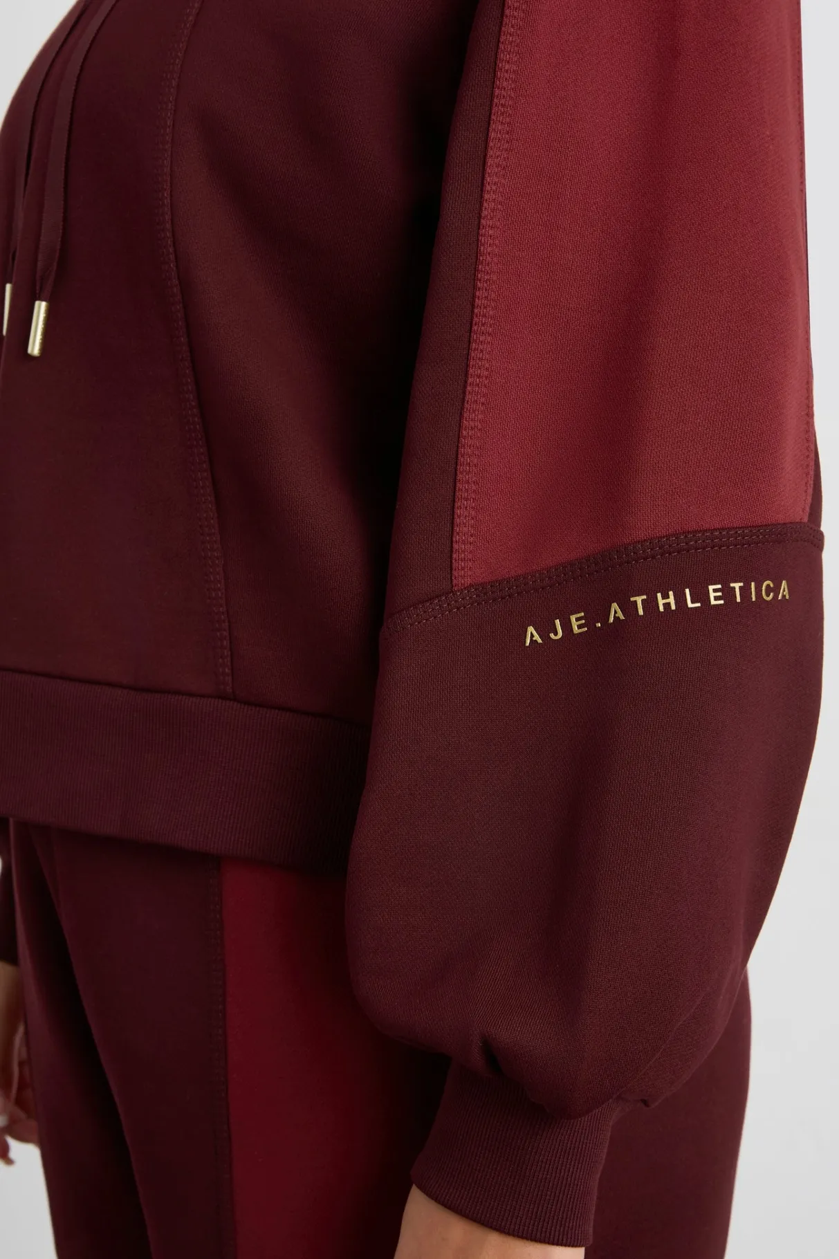 boxy_cropped_hoodie__11.webp Fashion Aje ATHLETICA Boxy Cropped Hoodie 405 Burgundy Red Currant