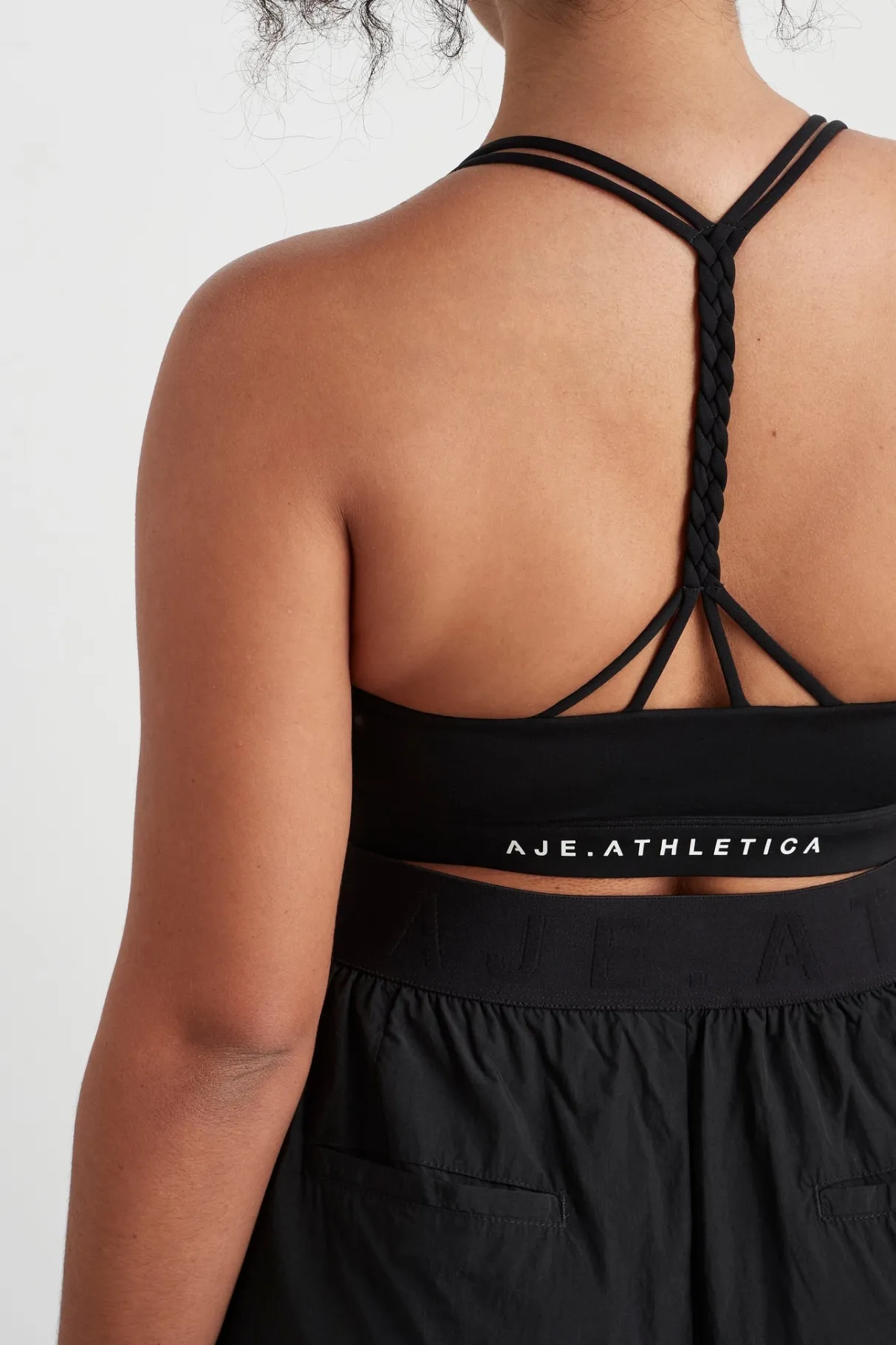 braided_strappy_sports_bra__11-2.webp Cheap Aje ATHLETICA Braided Strappy Sports Bra 334 Black/White