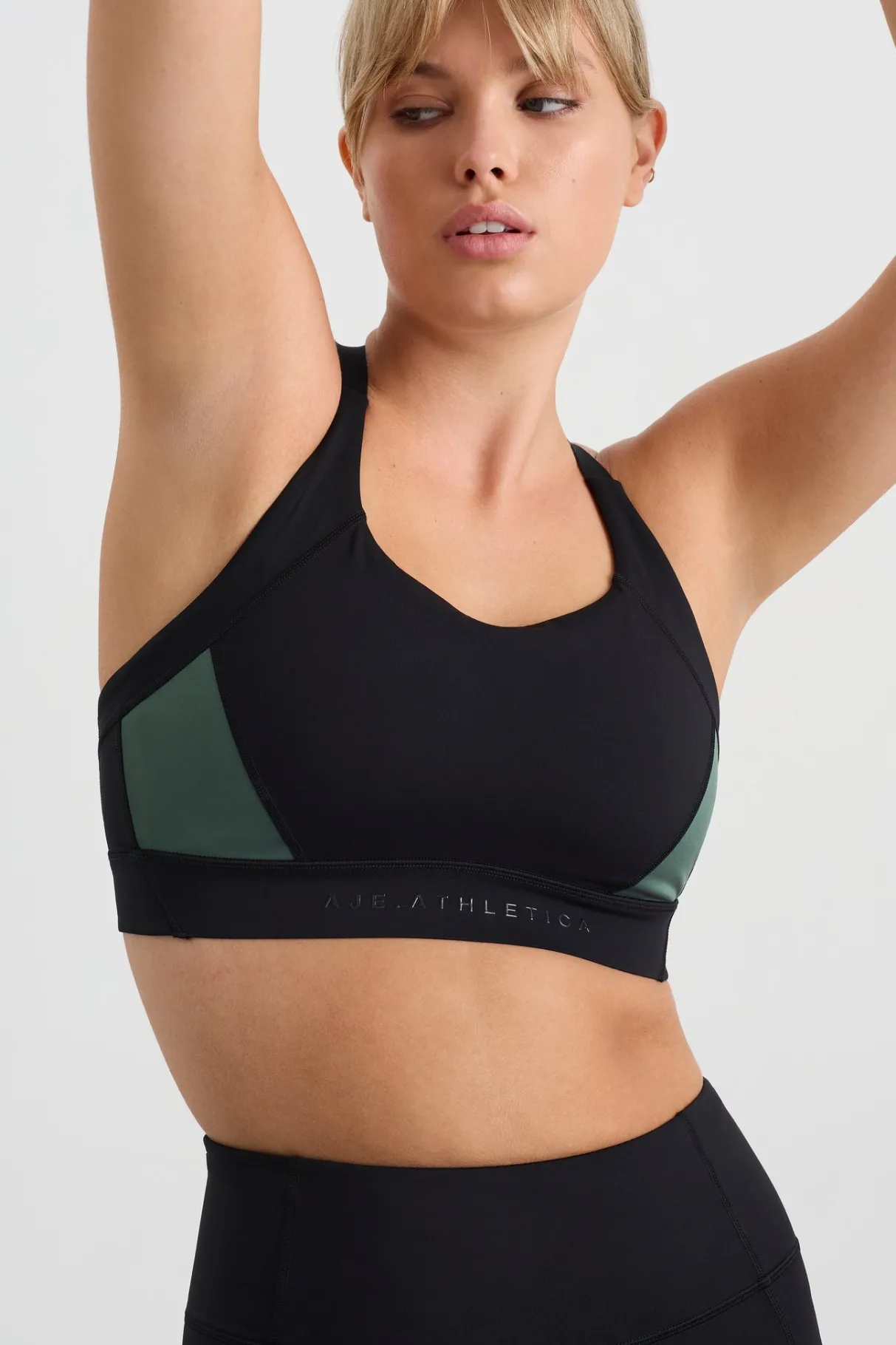 contrast_adjustable_strap_sports_bra__8-1.webp Fashion Aje ATHLETICA Contrast Adjustable Strap Sports Bra 321 Black Moss Green