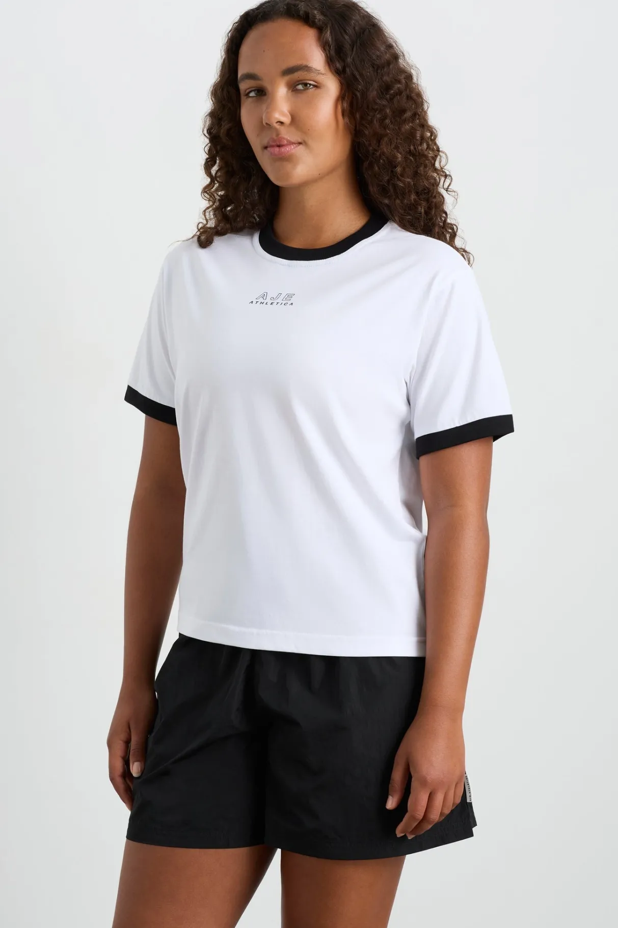 contrast_bind_logo_tee__5.webp Online Aje ATHLETICA Contrast Bind Logo Tee 110 White/Black