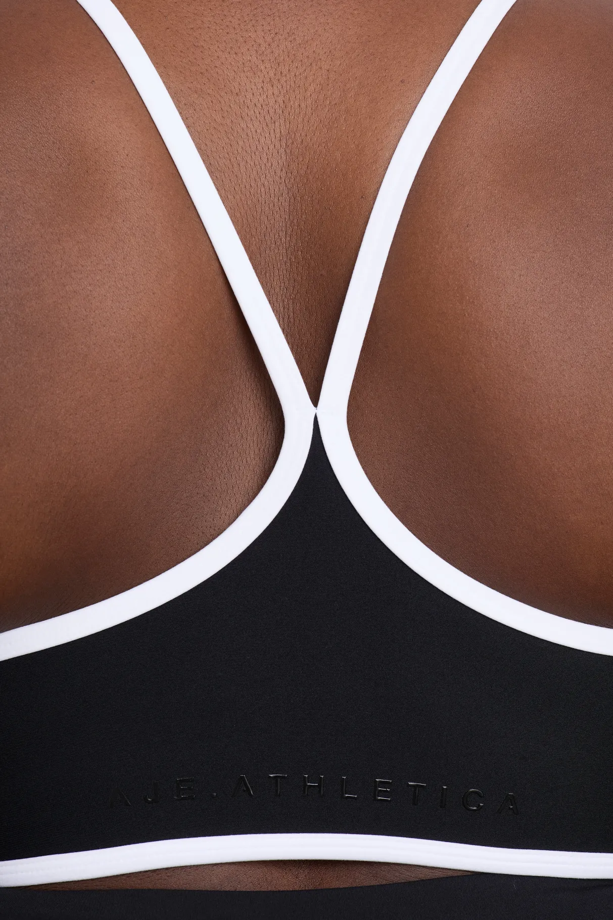 contrast_bind_sports_bra__11.webp Store Aje ATHLETICA Contrast Bind Sports Bra 307 Black/White