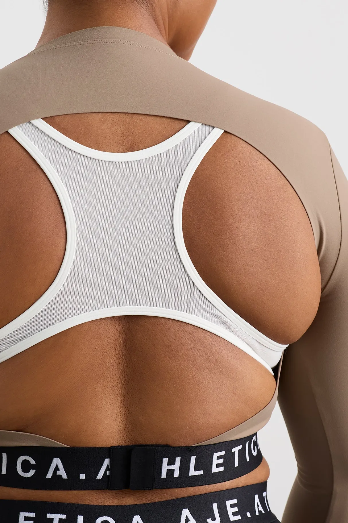 contrast_layered_crop_top__13.webp Shop Aje ATHLETICA Contrast Layered Crop Top 380 Dune/Winter White