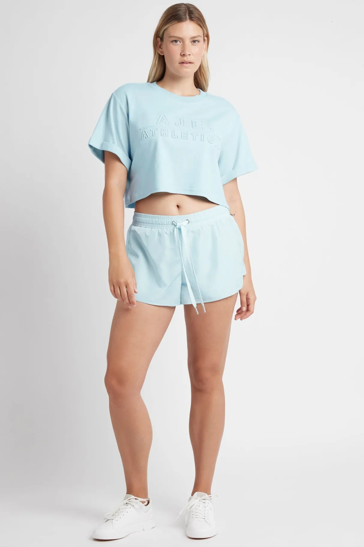 cropped_embossed_classic_logo_tshirt__10-1.webp Hot Aje ATHLETICA Cropped Embossed Classic Logo T-Shirt 105 Ice Blue