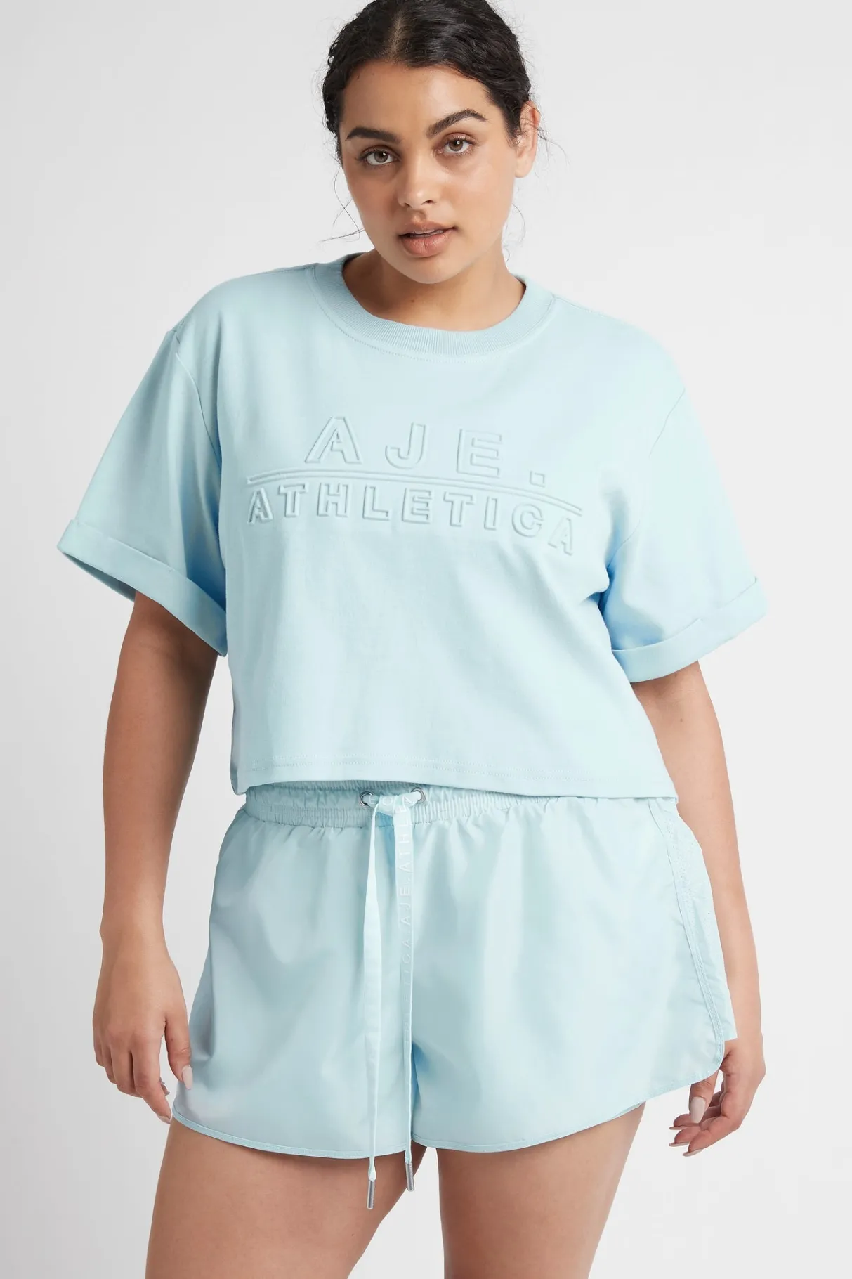 cropped_embossed_classic_logo_tshirt__11-1.webp Hot Aje ATHLETICA Cropped Embossed Classic Logo T-Shirt 105 Ice Blue