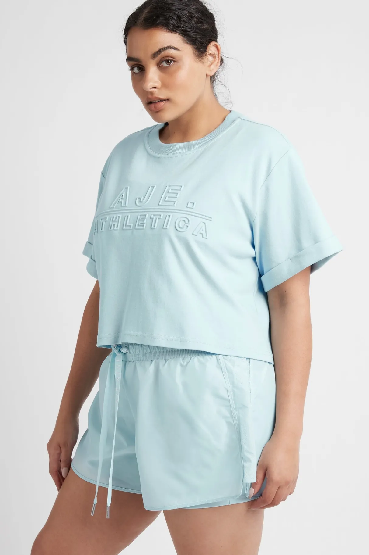 cropped_embossed_classic_logo_tshirt__12-1.webp Hot Aje ATHLETICA Cropped Embossed Classic Logo T-Shirt 105 Ice Blue