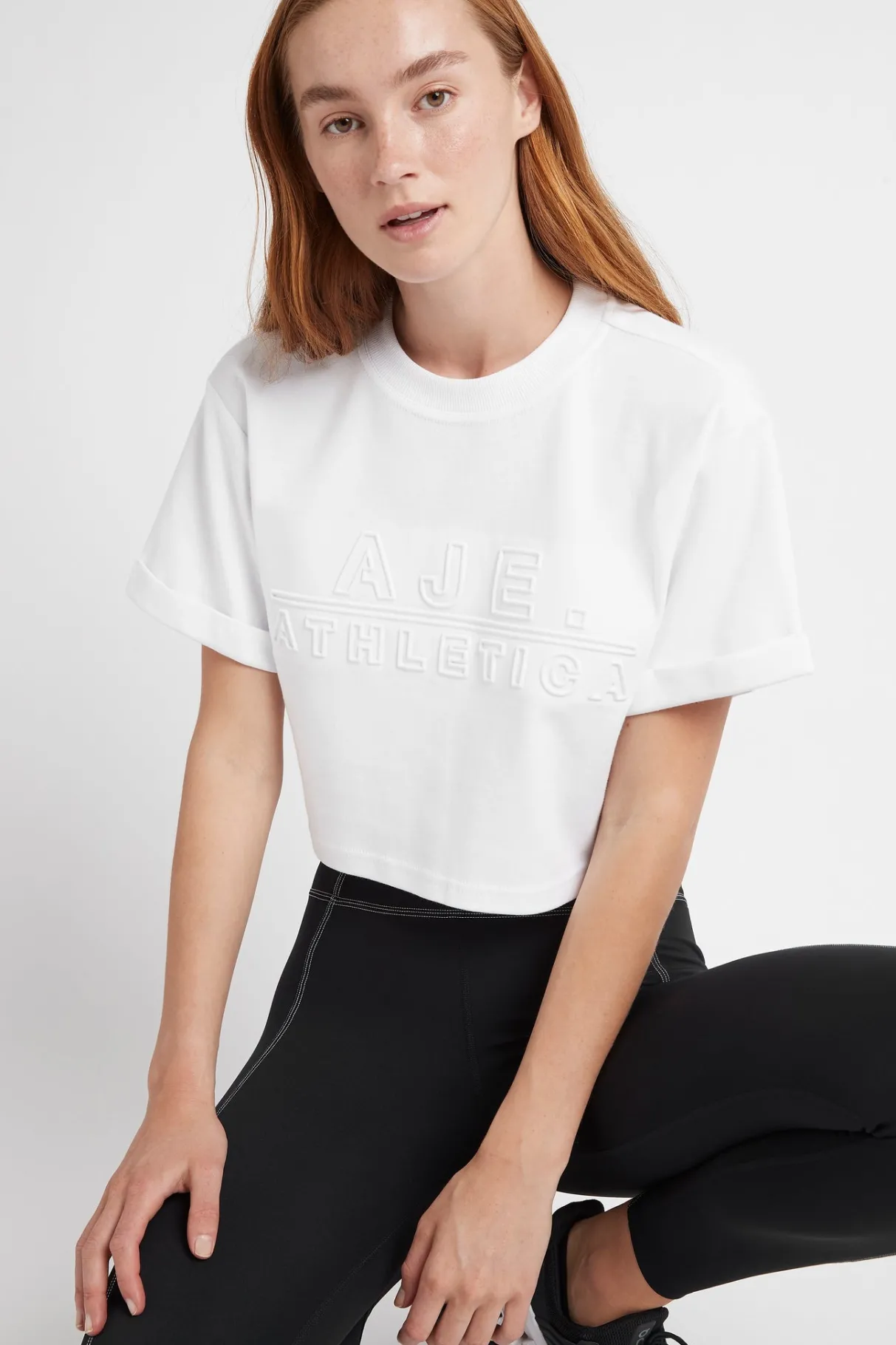cropped_embossed_classic_logo_tshirt__3.webp Hot Aje ATHLETICA Cropped Embossed Classic Logo T-Shirt 105 White