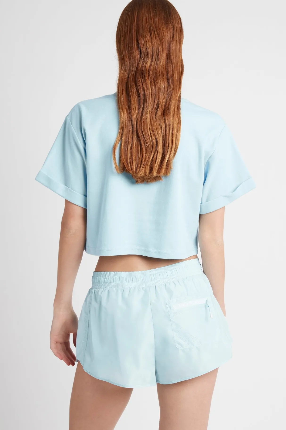 cropped_embossed_classic_logo_tshirt__4-1.webp Hot Aje ATHLETICA Cropped Embossed Classic Logo T-Shirt 105 Ice Blue