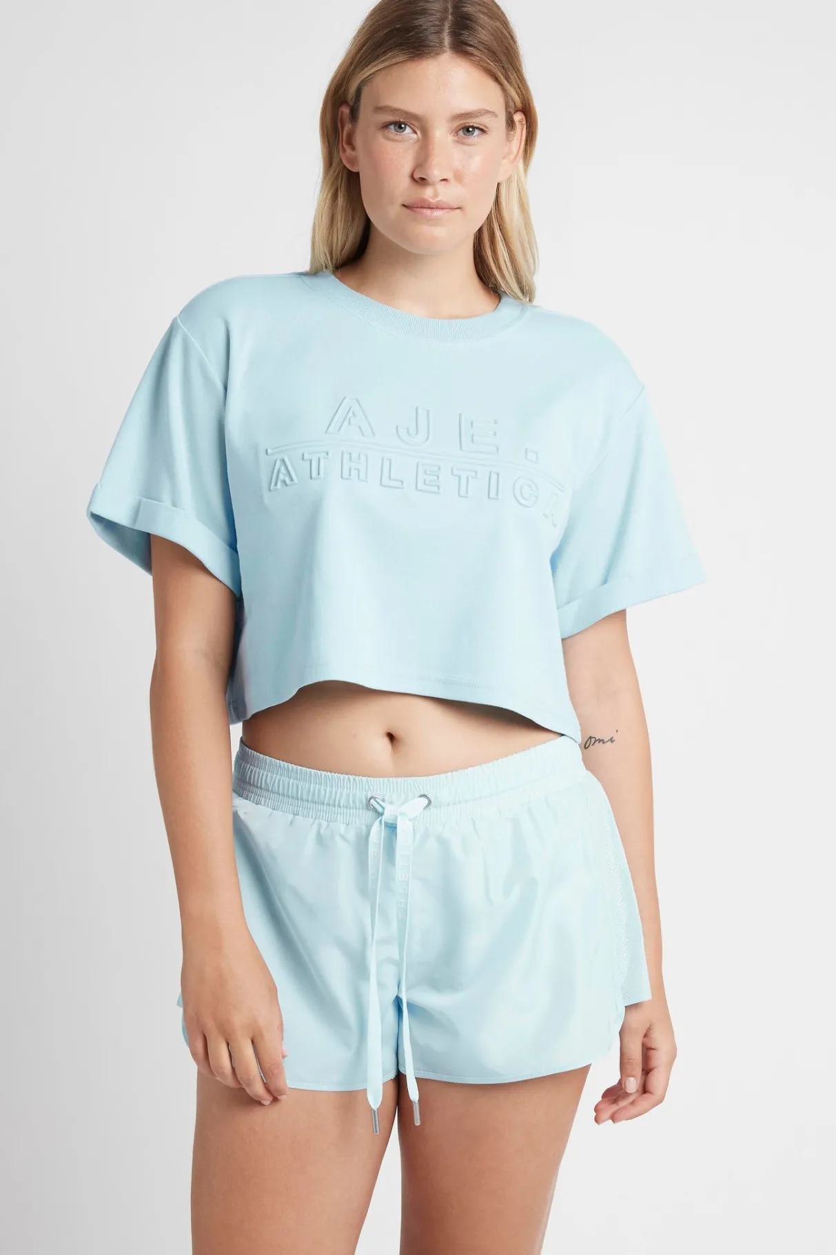cropped_embossed_classic_logo_tshirt__6-1.webp Hot Aje ATHLETICA Cropped Embossed Classic Logo T-Shirt 105 Ice Blue