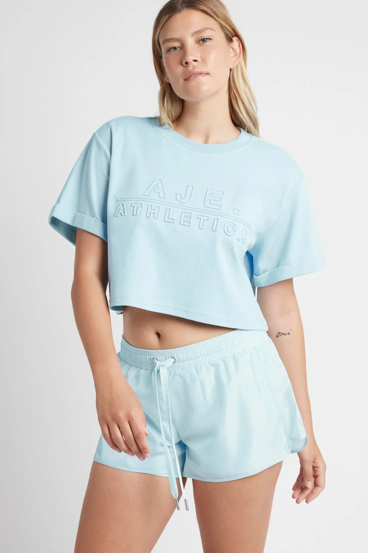 cropped_embossed_classic_logo_tshirt__7-1.webp Hot Aje ATHLETICA Cropped Embossed Classic Logo T-Shirt 105 Ice Blue