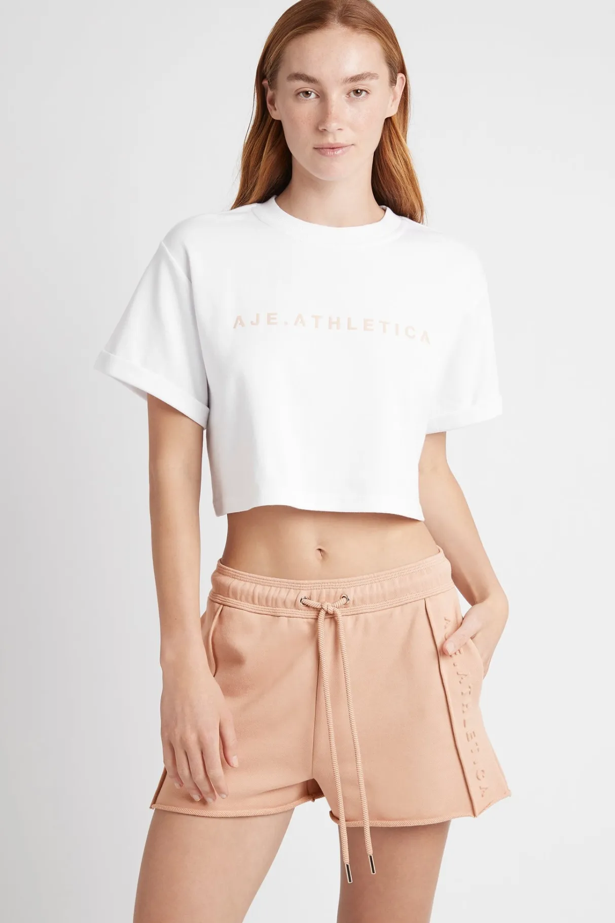 cropped_signature_logo_tshirt__0-3.webp New Aje ATHLETICA Cropped Signature Logo T-Shirt 104 White/Sand