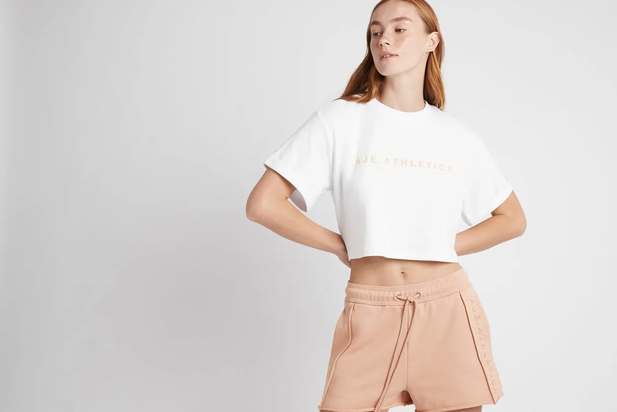 cropped_signature_logo_tshirt__16-1.webp New Aje ATHLETICA Cropped Signature Logo T-Shirt 104 White/Sand