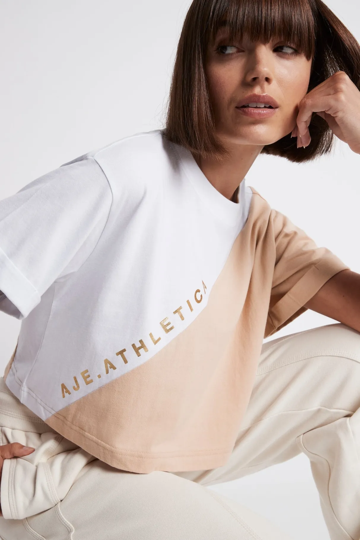 cropped_signature_logo_tshirt__2.webp Cheap Aje ATHLETICA Cropped Signature Logo T-Shirt 105 White/Sand
