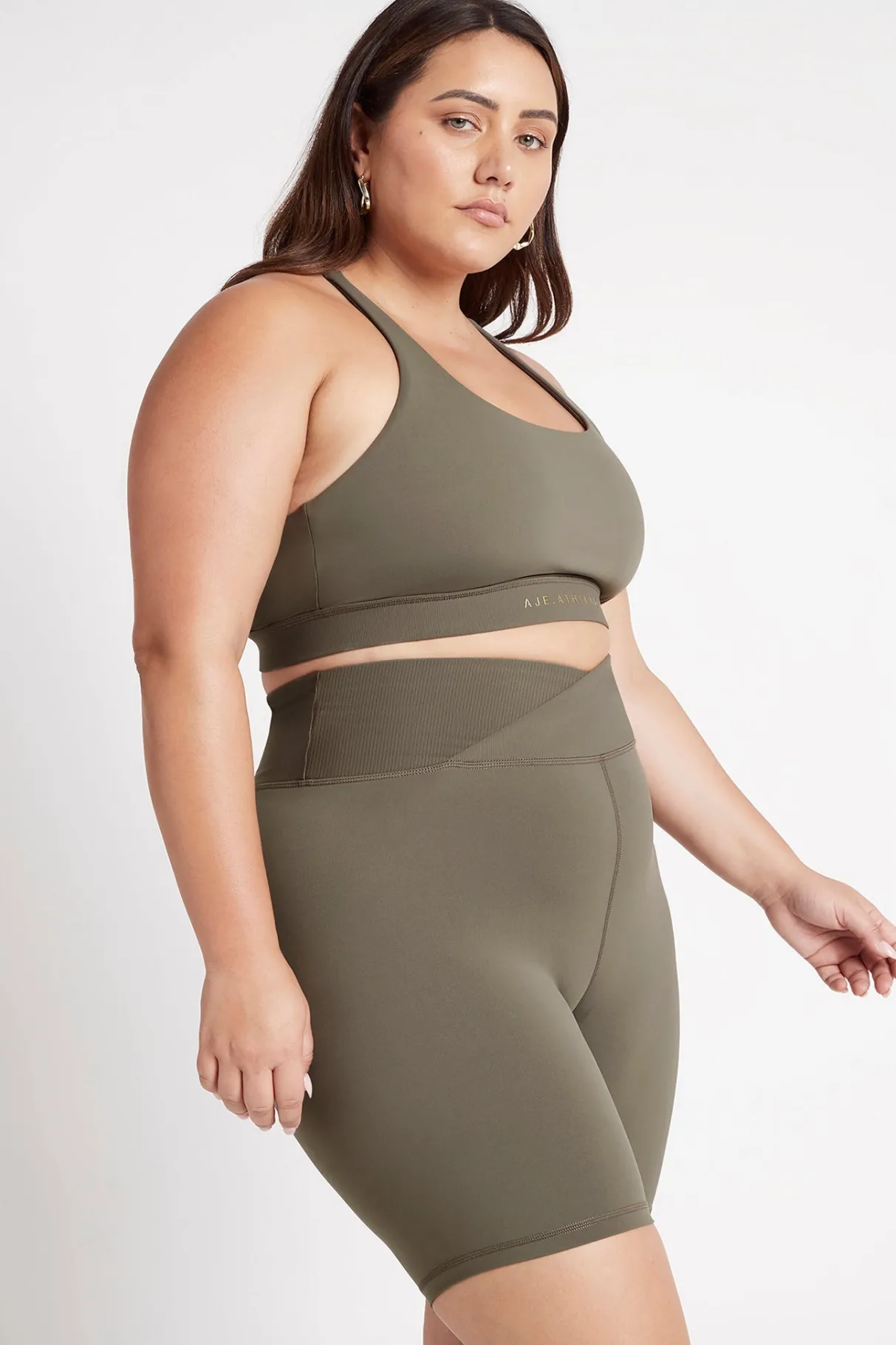 crossover_mid_length_bike_short__13.webp Flash Sale Aje ATHLETICA Crossover Mid Length Bike Short 614 Forest Green