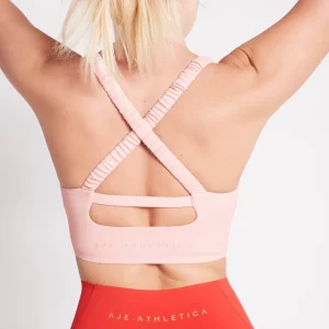 Store Aje ATHLETICA Cut Out Cross Back Sports Bra 314 Rose Quartz