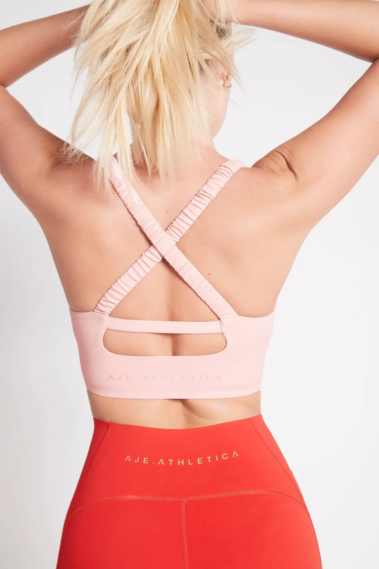 cut_out_cross_back_sports_bra__3-1.webp Store Aje ATHLETICA Cut Out Cross Back Sports Bra 314 Rose Quartz