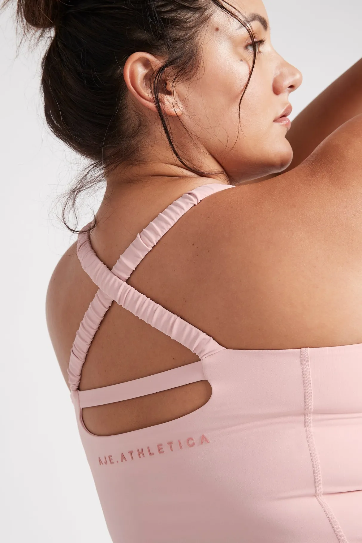 cut_out_cross_back_tank_top__14.webp Store Aje ATHLETICA Cut Out Cross Back Tank Top 125 Rose Quartz/Rose Pink