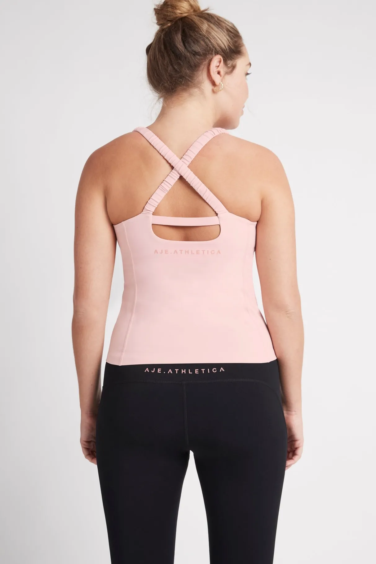 cut_out_cross_back_tank_top__9.webp Store Aje ATHLETICA Cut Out Cross Back Tank Top 125 Rose Quartz/Rose Pink