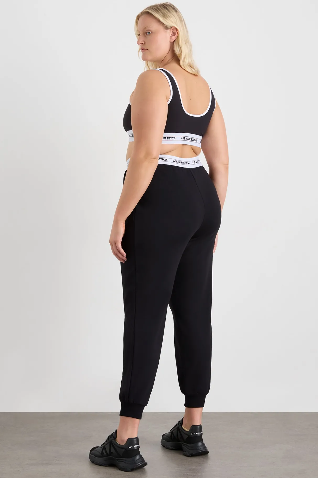 elastic_logo_trackpants__12.webp Shop Aje ATHLETICA Elastic Logo Trackpants 502 Black
