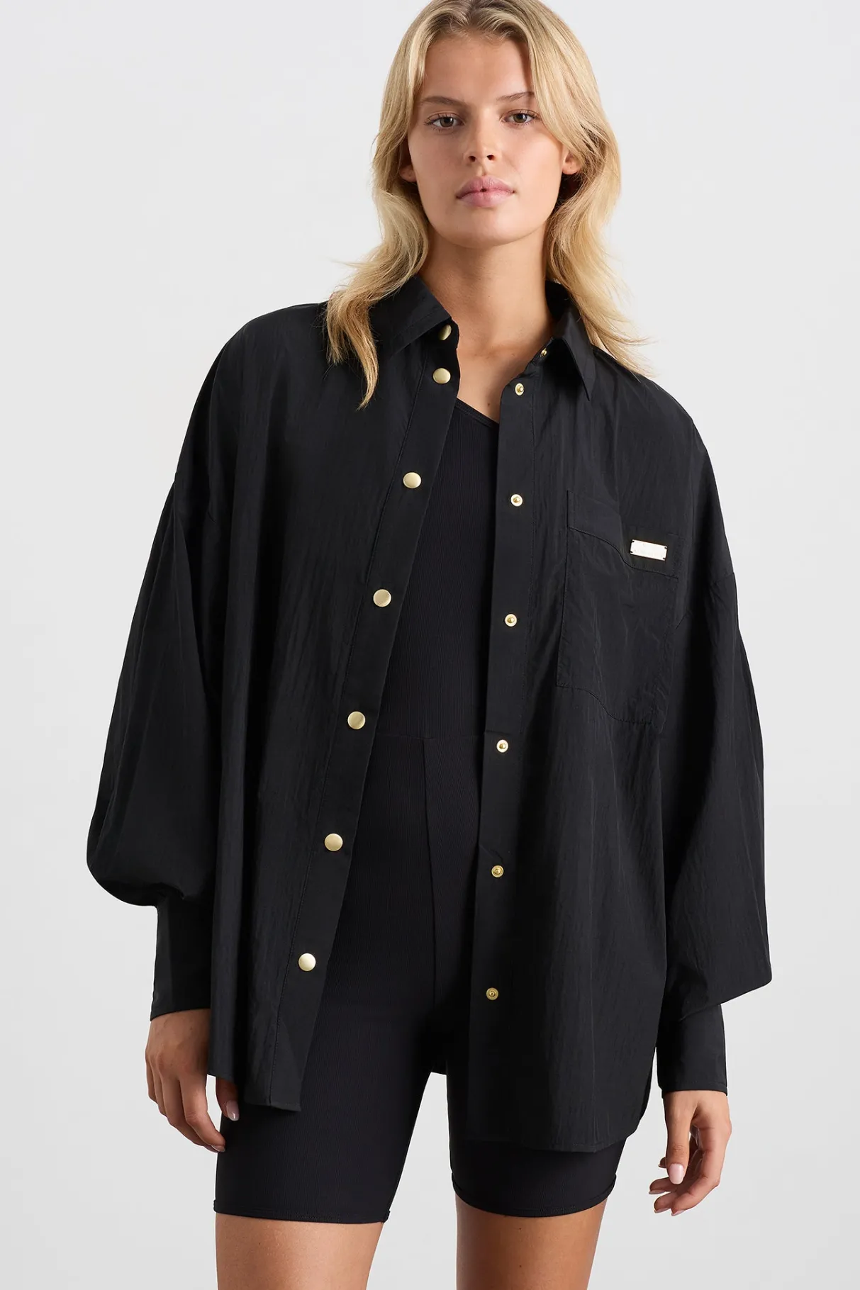 elastic_spray_windbreaker__0.webp Online Aje ATHLETICA Elastic Spray Windbreaker 430 Black