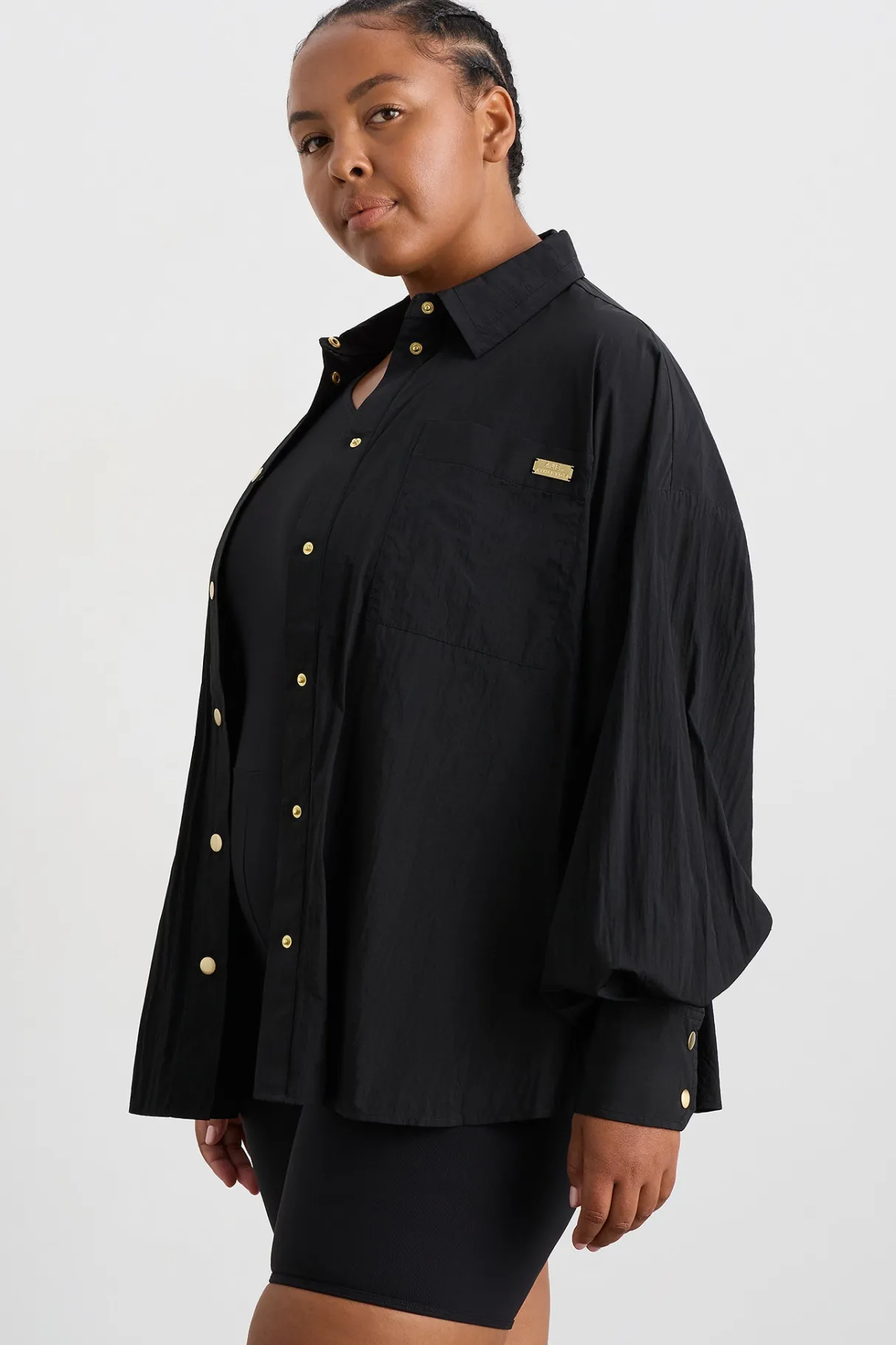 elastic_spray_windbreaker__12.webp Online Aje ATHLETICA Elastic Spray Windbreaker 430 Black
