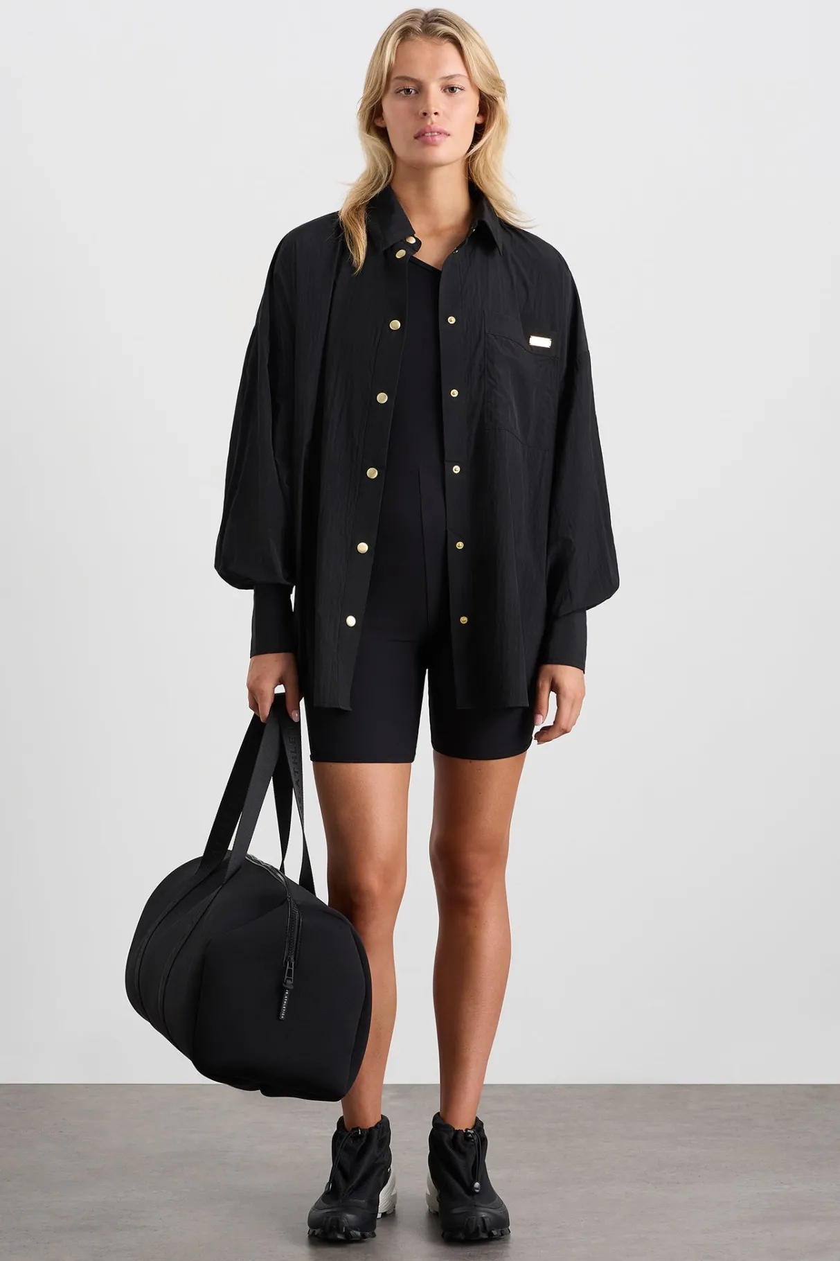 elastic_spray_windbreaker__2.webp Online Aje ATHLETICA Elastic Spray Windbreaker 430 Black
