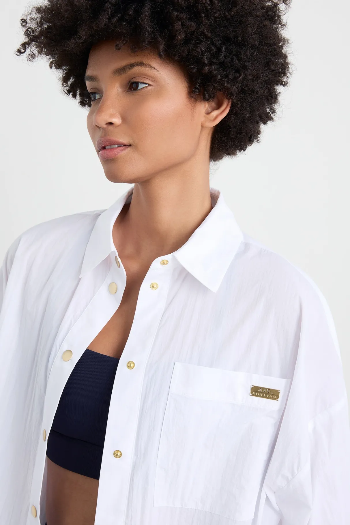 elastic_spray_windbreaker__3-1.webp Clearance Aje ATHLETICA Elastic Spray Windbreaker 430 White