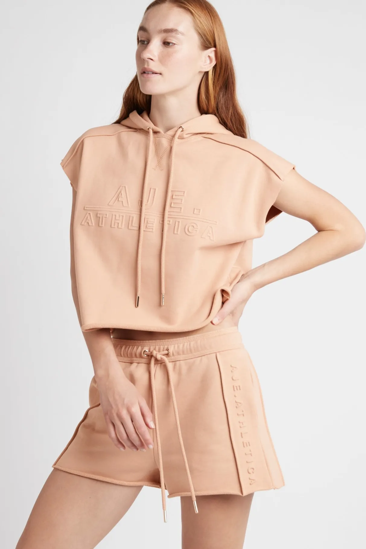 embossed_classic_short_sleeve_cropped_hoodie__0-1.webp Clearance Aje ATHLETICA Embossed Classic Short Sleeve Cropped Hoodie 402 Sand