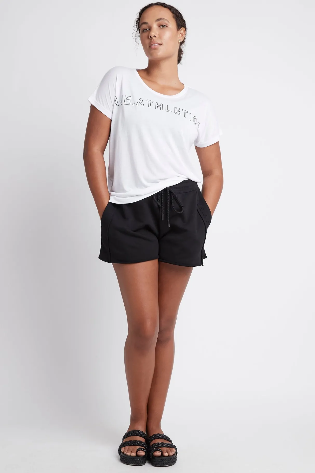 embossed_signature_logo_training_tshirt__10-1.webp Fashion Aje ATHLETICA Embossed Signature Logo Training T-Shirt 110 White/Black