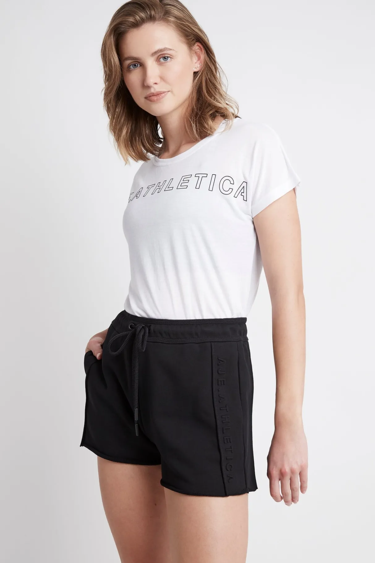 embossed_signature_logo_training_tshirt__2-1.webp Fashion Aje ATHLETICA Embossed Signature Logo Training T-Shirt 110 White/Black