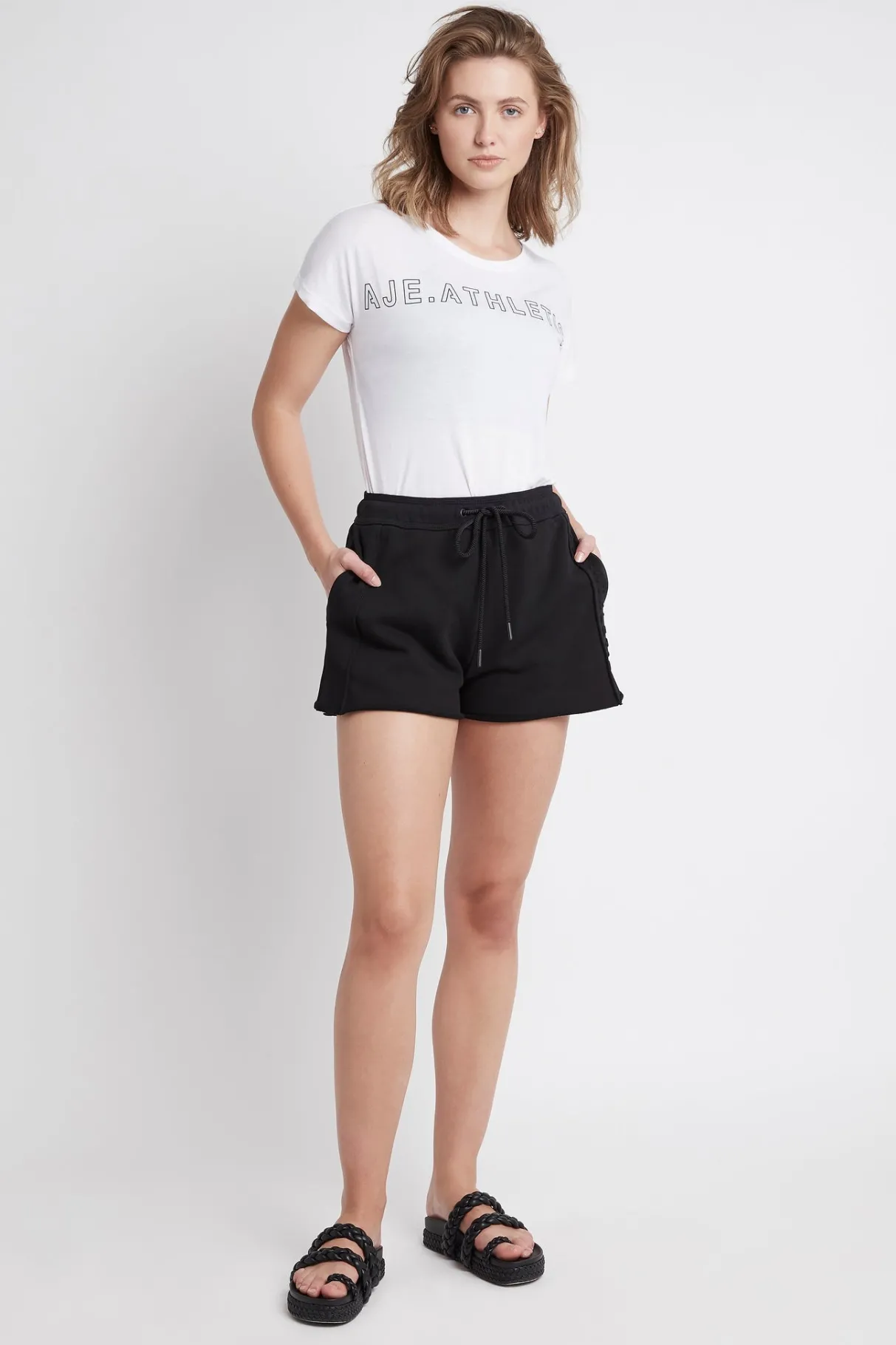 embossed_signature_logo_training_tshirt__5-1.webp Fashion Aje ATHLETICA Embossed Signature Logo Training T-Shirt 110 White/Black