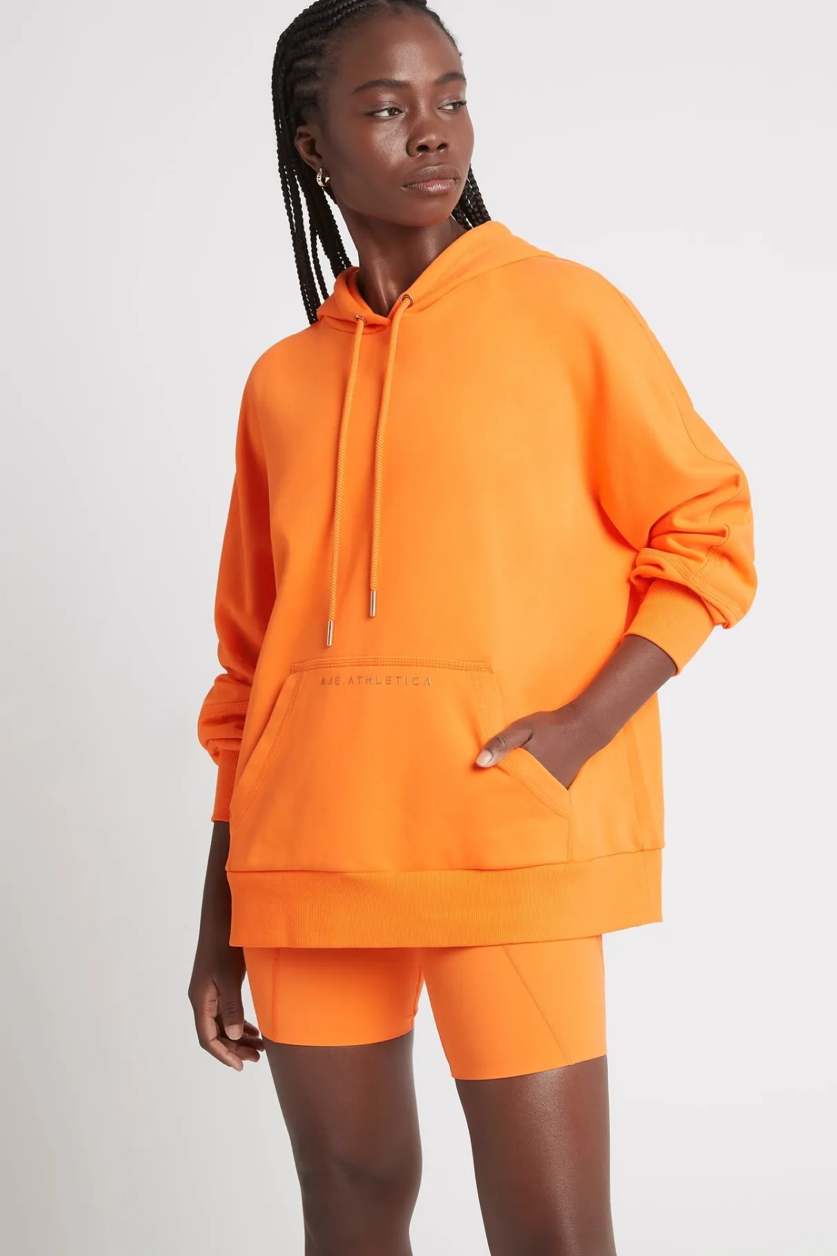 essential_hoodie__3-1.webp Cheap Aje ATHLETICA Essential Hoodie 411 Orange/Gold