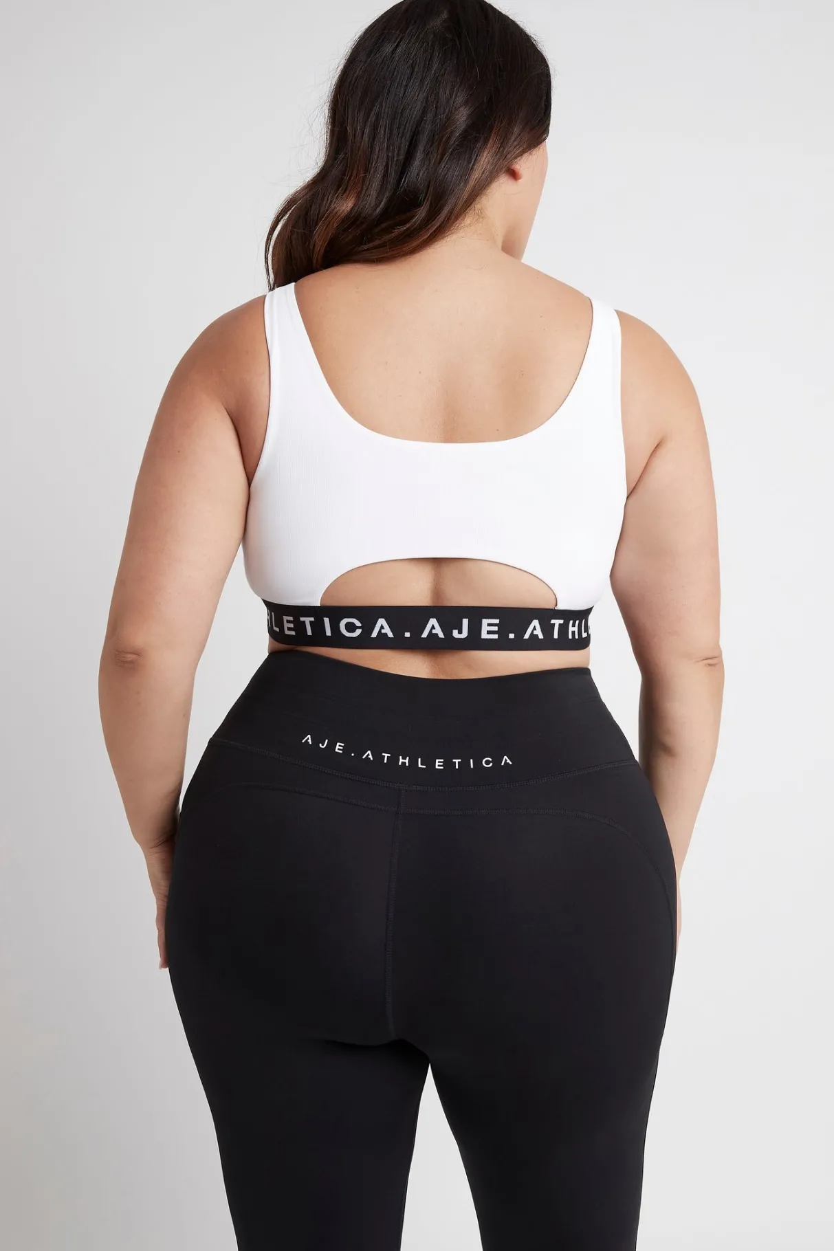 essential_logotape_sports_bra__13.webp Hot Aje ATHLETICA Essential Logotape Sports Bra 307 White/Black