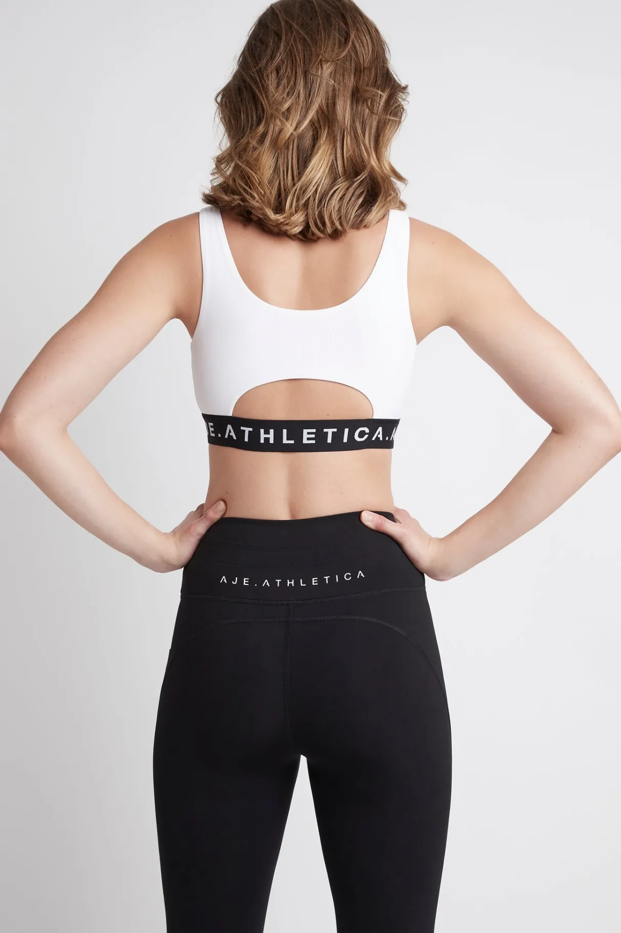 essential_logotape_sports_bra__4.webp Hot Aje ATHLETICA Essential Logotape Sports Bra 307 White/Black