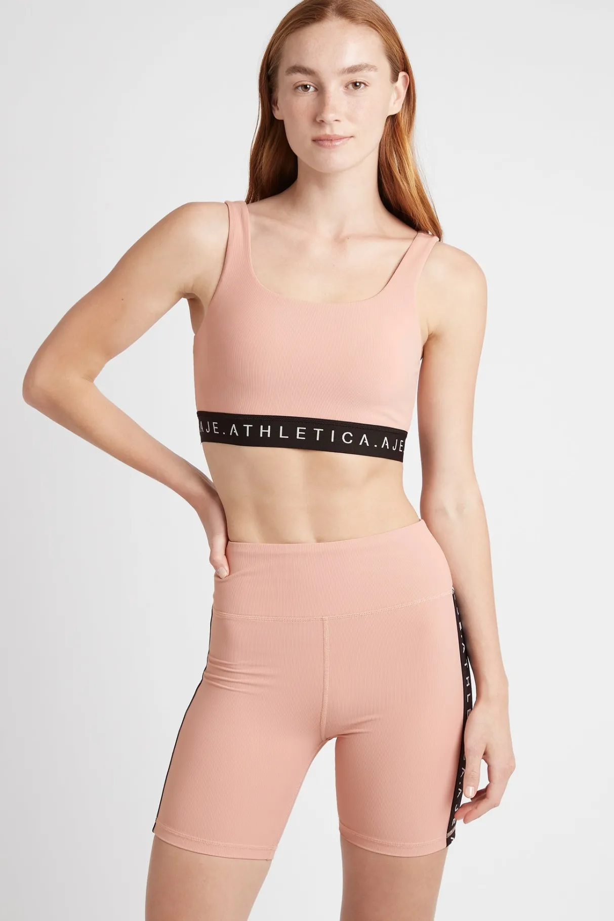 essential_mid_length_bike_shorts__0.webp Fashion Aje ATHLETICA Essential Mid Length Bike Shorts 601 Sunset Pink