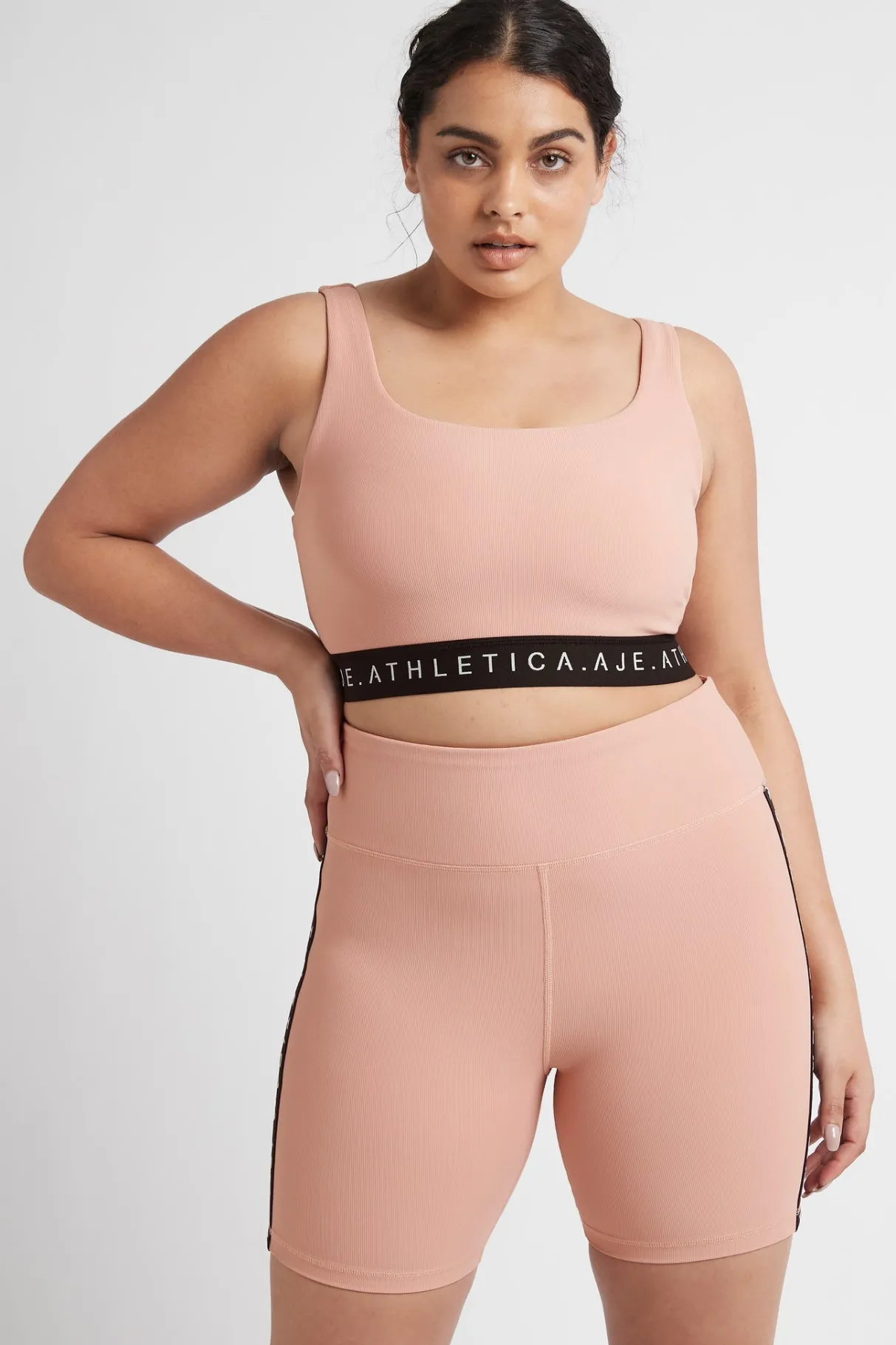 essential_mid_length_bike_shorts__11.webp Fashion Aje ATHLETICA Essential Mid Length Bike Shorts 601 Sunset Pink