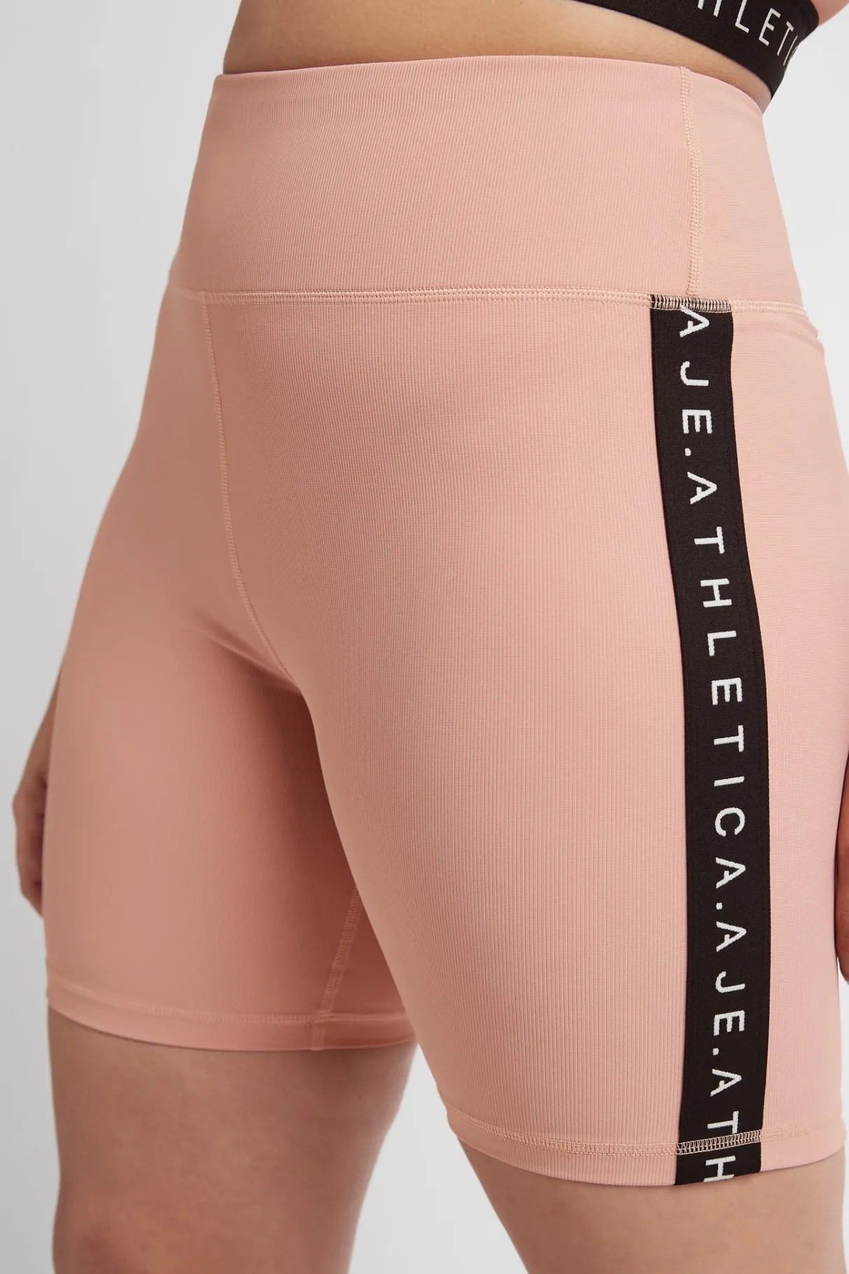 essential_mid_length_bike_shorts__13.webp Fashion Aje ATHLETICA Essential Mid Length Bike Shorts 601 Sunset Pink